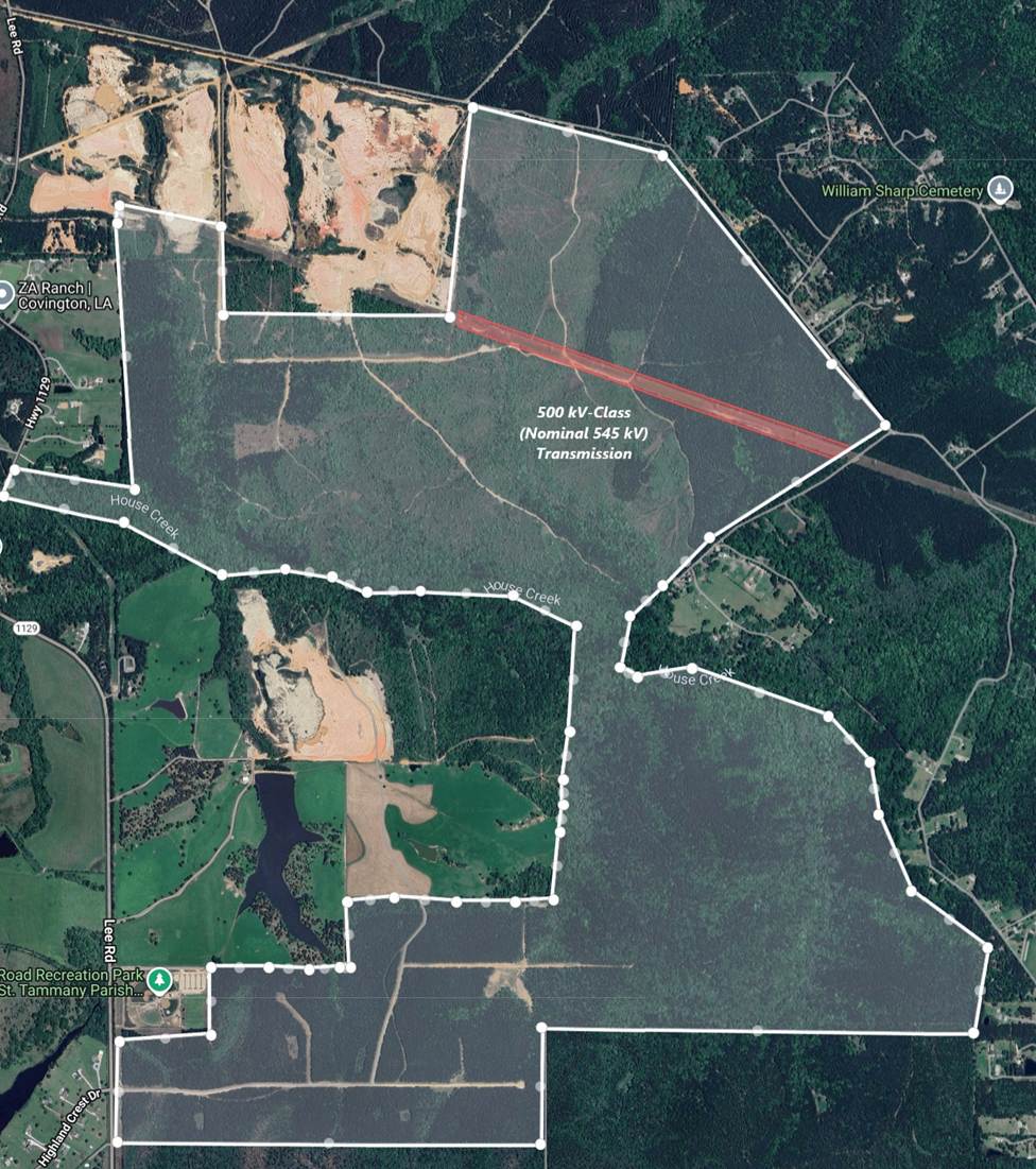 Satellite view of 1,503 acre property with boundaries and 500kV transmission line marked